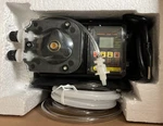 Blue-white Flexflo A1N00V-1T Peristaltic Chemical Feed Pump 5.7 Gpd. Fixed Price $1336.71.
